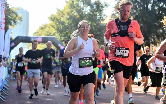 man and woman in a race