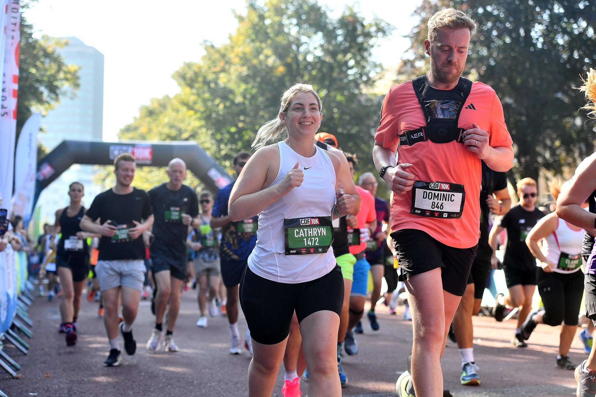 man and woman in a race